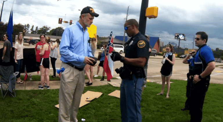 Former Hattiesburg City Councilman brandishes knife at flag protest. Police called.